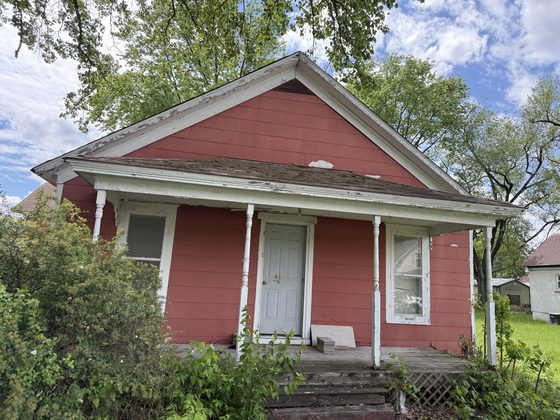 Weathered cottage needing repairs